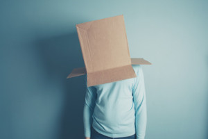 Man with a cardboard box over his head